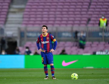 Barcelona's Argentine forward Lionel Messi reacts to Celta's Spanish forward Santi Mina's goal during the Spanish League football match between FC Barcelona and RC Celta de Vigo at the Camp Nou stadium in Barcelona on May 16, 2021. (Photo by Pau BARRENA /
