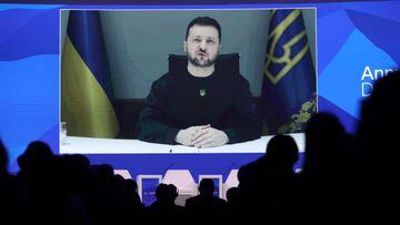 DAVOS, SWITZERLAND - JANUARY 18: Ukrainian President Volodymyr Zelensky on a screen as he speaks during the World Economic Forum (WEF) annual meeting via video link at the Congress Centre in Davos January 18, 2023. (Photo by Dursun Aydemir/Anadolu Agency via Getty Images)