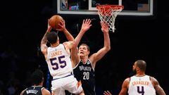 Oct 31, 2017; Brooklyn, NY, USA; Phoenix Suns guard Mike James (55) shoots over Brooklyn Nets center Timofey Mozgov (20) during the first half at Barclays Center. Mandatory Credit: Andy Marlin-USA TODAY Sports
