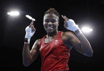 Britain's Nicola Adams happy with semi-final win in the flyweight 51-kg against China's Ren Cancan.