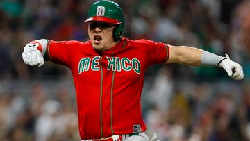 Mar 20, 2023; Miami, Florida, USA; Mexico second baseman Luis Urias (3) celebrates after hitting a two-run home run during the fourth inning against Japan at LoanDepot Park. Mandatory Credit: Sam Navarro-USA TODAY Sports