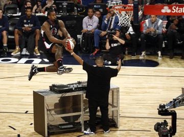 Feb 18, 2017; New Orleans, LA, USA; Los Angeles Clippers center DeAndre Jordan (6) dunks over DJ Khaled in the slam dunk contest during NBA All-Star Saturday Night at Smoothie King Center. Mandatory Credit: Derick E. Hingle-USA TODAY Sports