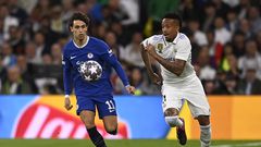 Real Madrid's Brazilian defender Eder Militao (R) vies with Chelsea's Portuguese forward Joao Felix during the UEFA Champions League quarter final first leg football match between Real Madrid CF and Chelsea FC at the Santiago Bernabeu stadium in Madrid on April 12, 2023. (Photo by OSCAR DEL POZO / AFP)