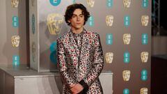 (FILES) In this file photo taken on February 10, 2019 French-US actor Timothee Chalamet poses on the red carpet upon arrival at the BAFTA British Academy Film Awards at the Royal Albert Hall in London. - New York&#039;s star-studded Met Gala will focus on youth and diversity this year, with four co-chairs under the age of 30 -- actor Timothee Chalamet, poet Amanda Gorman, singer Billie Eilish and tennis player Naomi Osaka. (Photo by Tolga AKMEN / AFP)