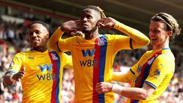 Crystal Palace&#039;s Wilfried Zaha, center, celebrates scoring their side&#039;s second goal of the game during their English Premier League soccer match against Southampton at St Mary&#039;s Stadium, Southampton, England, Saturday, April 30, 2022. (Andr