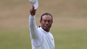 FILE PHOTO: Golf - The 150th Open Championship - Old Course, St Andrews, Scotland, Britain - July 15, 2022 Tiger Woods of the U.S. acknowledges the fans after holing on the 18th and finishing his second round REUTERS/Russell Cheyne/File Photo