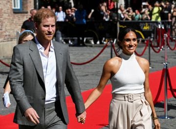 Britain's Prince Harry and his wife Meghan