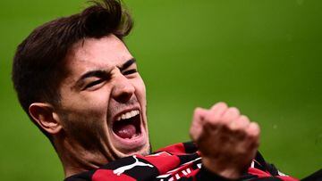 AC Milan's Spanish midfielder Brahim Diaz celebrates after opening the scoring during the UEFA Champions League round of 16, first leg football match between AC Milan and Tottenham Hotspur on February 14, 2023 at the San Siro stadium in Milan. (Photo by Marco BERTORELLO / AFP)