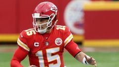 KANSAS CITY, MISSOURI - JANUARY 17: Quarterback Patrick Mahomes #15 of the Kansas City Chiefs scrambles during the AFC Divisional Playoff game against the Cleveland Browns at Arrowhead Stadium on January 17, 2021 in Kansas City, Missouri.   Jamie Squire/G