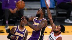 LeBron helps Lakers snap losing streak, Butler stars for Heat