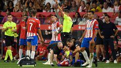 Girona's Spanish forward Portu receives medical attention during the Spanish Liga football match between Girona FC and Real Madrid CF at the Montilivi stadium in Girona on September 30, 2023. (Photo by Josep LAGO / AFP)