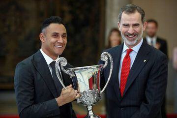 Keylor Navas receives the Iberoamericana Community Trophy from King Felipe VI in Madrid this morning.