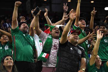 Mexico's supporters cheer during the Concacaf 2023 Gold Cup Group B football match between Mexico and Honduras at the NRG Stadium in Houston, Texas on June 25, 2023. (Photo by Mark Felix / AFP)