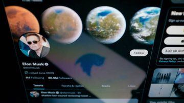 In this photo illustration Twitter logo seen displayed on a smartphone screen with Elon Musk Twitter in the background in Chania, Crete Island, Greece on April 23, 2022.  (Photo illustration by Nikolas Kokovlis/NurPhoto via Getty Images)