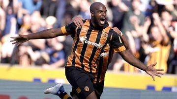 Hull City's Oscar Estupinan celebrates scoring their side's second goal of the game with team-mate Allahyar Sayyadmanesh during the Sky Bet Championship match at the MKM Stadium, Hull. Picture date: Saturday August 13, 2022. (Photo by Richard Sellers/PA Images via Getty Images)