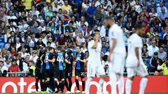 Club Brugge's players celebrate after Nigerian forward Emmanuel Bonaventure scored a second goal during the UEFA Champions league Group A football match between Real Madrid and Club Brugge at the Santiago Bernabeu stadium in Madrid on October 1, 2019.
