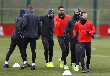 Manchester United's Juan Mata, Anthony Martial and Chris Smalling during training