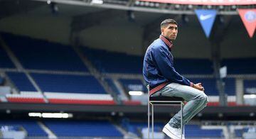 Paris Saint-Germain's new player, Moroccan defender Achraf Hakimi looks on ahead of press conference at the Parc des Princes stadium in Paris on July 8, 2021. (Photo by FRANCK FIFE / AFP)