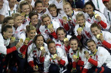 Britain's women show off their gold medals.
