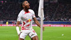 LEIPZIG, GERMANY - OCTOBER 25: Christopher Nkunku of RB Leipzig celebrates scoring their side's second goal during the UEFA Champions League group F match between RB Leipzig and Real Madrid at Red Bull Arena on October 25, 2022 in Leipzig, Germany. (Photo by Oliver Hardt - UEFA/UEFA via Getty Images,)