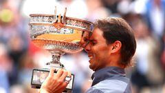 PARIS, FRANCE - JUNE 09: Rafael Nadal of Spain celebrates with the trophy following the mens singles final against Dominic Thiem of Austria during Day fifteen of the 2019 French Open at Roland Garros on June 09, 2019 in Paris, France. (Photo by Clive Brun