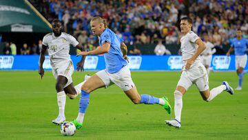 Erling Haaland of Manchester City makes a break during the pre-season friendly match between Bayern Munich and Manchester City at Lambeau Field on July 23, 2022 in Green Bay, Wisconsin.