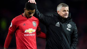 MANCHESTER, ENGLAND - DECEMBER 01: Marcus Rashford of Manchester United is consolled by Ole Gunnar Solskjaer, Manager of Manchester United after the Premier League match between Manchester United and Aston Villa at Old Trafford on December 01, 2019 in Man