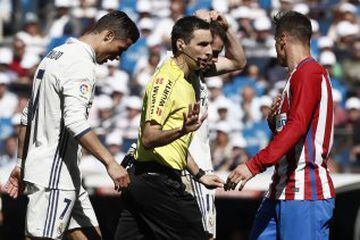 Cristiano Ronaldo, referee Ricardo De Burgos Bengoetxea and Fernando Torres