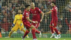 Liverpool&#039;s Luis Diaz, left, celebrates after scoring his side&#039;s opening goal during the English Premier League soccer match between Liverpool and Tottenham Hotspur at Anfield stadium in Liverpool, England, Saturday, May 7, 2022. (AP Photo/Jon S