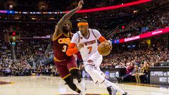 CLEVELAND, OH - FEBRUARY 23: Derrick Williams #3 of the Cleveland Cavaliers puts pressure on Carmelo Anthony #7 of the New York Knicks during the first half at Quicken Loans Arena on February 23, 2017 in Cleveland, Ohio. The Cavaliers defeated the Knicks 119-104. NOTE TO USER: User expressly acknowledges and agrees that, by downloading and/or using this photograph, user is consenting to the terms and conditions of the Getty Images License Agreement. (Photo by Jason Miller/Getty Images)