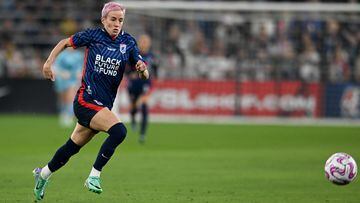 OL Reign's US midfielder #15 Megan Rapinoe controls the ball during the National Women's Soccer League final match between OL Reign and Gotham FC at Snapdragon Stadium in San Diego, California, on November 11, 2023. (Photo by Robyn Beck / AFP)