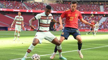 MADRID, SPAIN - JUNE 04: Nelson Semedo of Portugal is challenged by Pablo Sarabia of Spain during the international friendly match between Spain and Portugal at Estadio Wanda Metropolitano on June 04, 2021 in MADRID, Spain. (Photo by David Ramos/Getty Images)