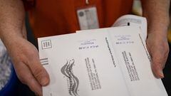 "On Demand" absentee or mail-in ballots are time stamped after being filled out in Doylestown, Pennsylvania, U.S. October 31, 2022. REUTERS/Hannah Beier