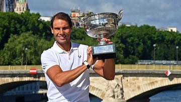 Rafa Nadal poses with the trophy after his 14th French Open triumph.
