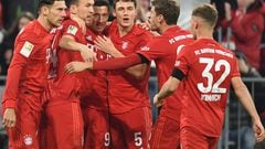 Munich's team celebrates scoring during the German first division Bundesliga football match Bayern Munich v Schalke 04 in Munich on January 25, 2020. (Photo by Christof STACHE / AFP) / DFL REGULATIONS PROHIBIT ANY USE OF PHOTOGRAPHS AS IMAGE SEQUENCES AND/OR QUASI-VIDEO