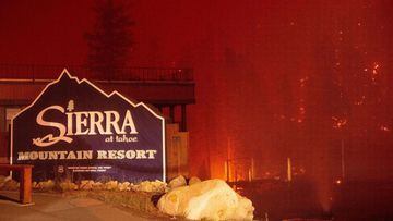 Flames surround the Sierra-at-Tahoe Resort during the Caldor fire in Twin Bridges, California on August 30, 2021. (Photo by JOSH EDELSON / AFP)