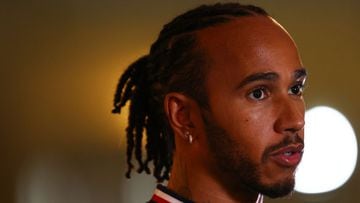 ABU DHABI, UNITED ARAB EMIRATES - DECEMBER 09: Lewis Hamilton of Great Britain and Mercedes GP talks to the media in the Paddock  during previews ahead of the F1 Grand Prix of Abu Dhabi at Yas Marina Circuit on December 09, 2021 in Abu Dhabi, United Arab 