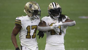 NEW ORLEANS, LOUISIANA - DECEMBER 25: Emmanuel Sanders #17 and Alvin Kamara #41 of the New Orleans Saints speak between plays during the fourth quarter against the Minnesota Vikings at Mercedes-Benz Superdome on December 25, 2020 in New Orleans, Louisiana