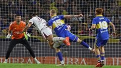 Lanus' forward Leandro Diaz (2-L) heads the ball to score during the Argentine Professional Football League Tournament 2023 match between Boca Juniors and Lanus at La Bombonera stadium in Buenos Aires, on June 10, 2023. (Photo by ALEJANDRO PAGNI / AFP)