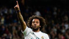 Real Madrid&#039;s Brazilian defender Marcelo celebrates after scoring his team&#039;s third goal during the Spanish league football match Real Madrid CF vs SD Eibar at the Santiago Bernabeu stadium in Madrid on October 22, 2017. / AFP PHOTO / PIERRE-PHIL