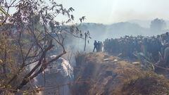Crowds gather at the crash site of an aircraft carrying 72 people in Pokhara in western Nepal January 15, 2023. Sagar Raj Timilsina/Handout via REUTERS    THIS IMAGE HAS BEEN SUPPLIED BY A THIRD PARTY. MANDATORY CREDIT. NO RESALES. NO ARCHIVES.