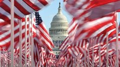 WASHINGTON, DC - JANUARY 19: The Capitol building is seen surrounded by American flags on the National Mall on January 19, 2021 in Washington, DC. Tight security measures are in place for Inauguration Day due to greater security threats after the attack o