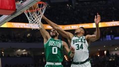 MILWAUKEE, WISCONSIN - MAY 07: Jayson Tatum #0 of the Boston Celtics is fouled by Giannis Antetokounmpo #34 of the Milwaukee Bucks during the second quarter of Game Three of the Eastern Conference Semifinals at Fiserv Forum on May 07, 2022 in Milwaukee, W
