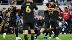 Oct 28, 2023; Los Angeles, CA, USA; Los Angeles FC forward Denis Bouanga (99) celebrates with teammates after scoring a goal against the Vancouver Whitecaps FC in the first half of game one in a round one match of the 2023 MLS Cup Playoffs at BMO Stadium. Mandatory Credit: Jonathan Hui-USA TODAY Sports