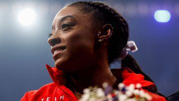FILE PHOTO: Simone Biles smiles after the closing ceremony in which she was named to the Olympic team during the final day of women&#039;s competition in the U.S. Olympic Team Trials for gymnastics in St. Louis, Missouri, U.S., June 27, 2021. Picture take