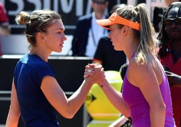 Elina Svitolina of Ukraine shakes hands with Simona Halepof Romania after their women's final of the Italian Open.