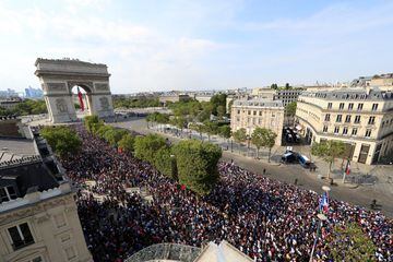 Soccer Football - World Cup - France Victory Parade on the Champs Elysees - Paris, France - July 16, 2018 France fans gather near the Arc de Triomphe as they await the arrival of the team