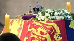 LONDON, ENGLAND - SEPTEMBER 17: The coffin carrying Queen Elizabeth II is draped in the Royal Standard and adorned with the Imperial State Crown and the Sovereign's orb and sceptre, rests in Westminster Hall for the Lying-in State on September 17, 2022 in London, England. Members of the public are able to pay respects to Her Majesty Queen Elizabeth II for 23 hours a day from 17:00 on September 14, 2022 until 06:30 on September 19, 2022.  Queen Elizabeth II died at Balmoral Castle in Scotland on September 8, 2022, and is succeeded by her eldest son, King Charles III. (Photo by Karwai Tang/WireImage)