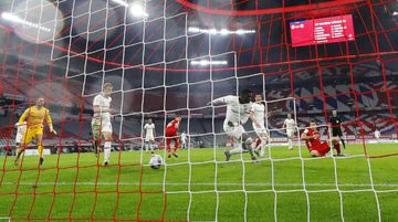 Lewandowski (second right) puts Bayern Munich 2-1 up in their DFB-Pokal win over Eintracht Frankfurt on Wednesday.