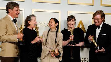 Producers Peter Spears, Frances McDormand, Chloe Zhao, Mollye Asher and Dan Janvey, winners of the award for best picture for &quot;Nomadland,&quot; pose at the press room of the Oscars, in the 93rd Academy Awards in Los Angeles, California, U.S., April 25, 2021. Chris Pizzello/Pool via REUTERS